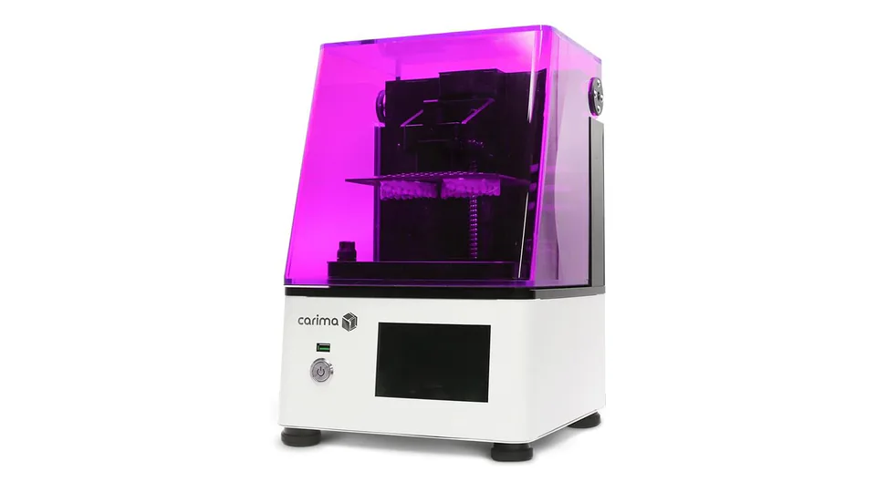 CARIMA IML LCD dental 3D printer with its magenta protective cover